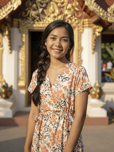 Kanya, 24-year-old Thai woman from Chiang Mai near temple seeking genuine partnership